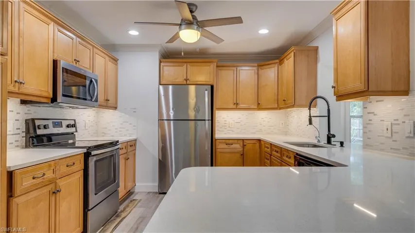 Kitchen has Quartz Countertops.