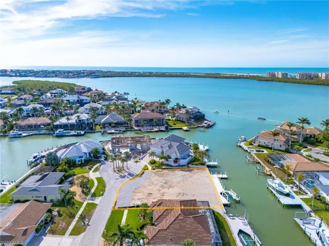 Aerial view with a residential view and a water view