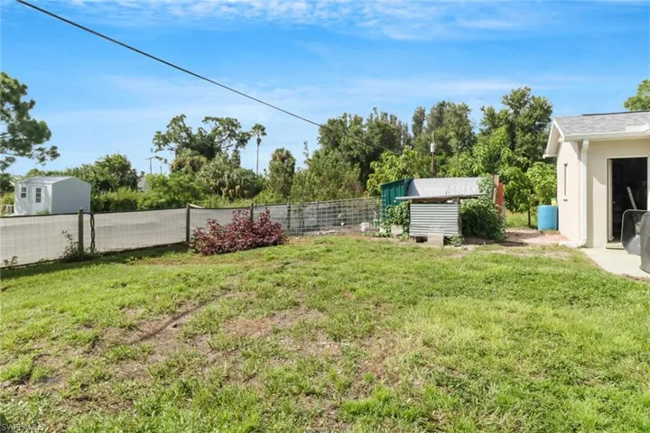 View of yard with a shed