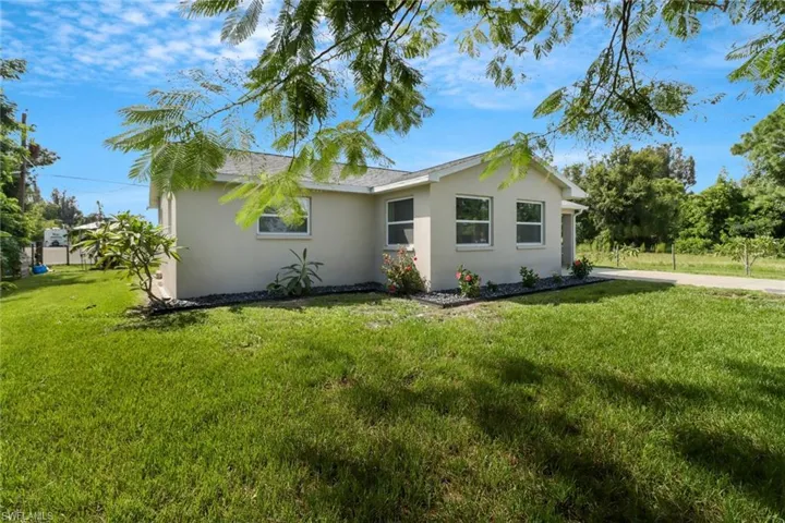 Ranch-style home with a front yard