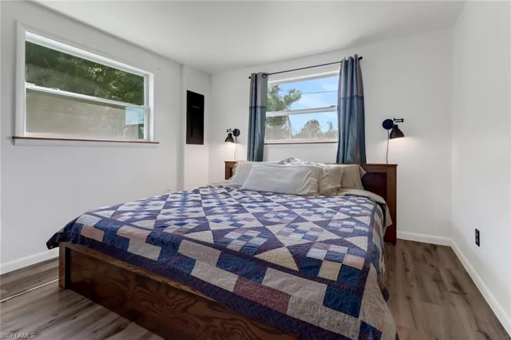 Bedroom featuring wood-type flooring