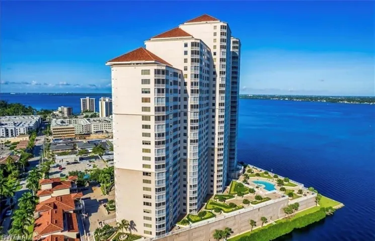 View of building exterior featuring a water view