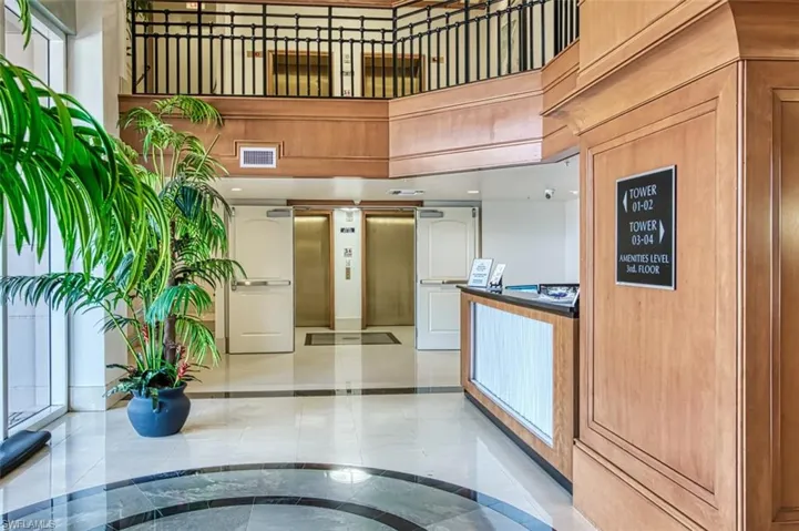 Reception area featuring a towering ceiling