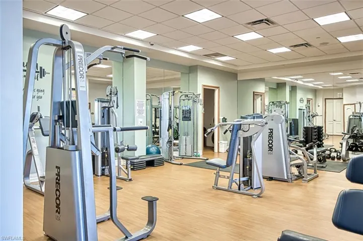 Workout area with a paneled ceiling