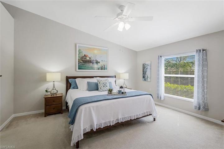 master bedroom w/king bed and volume ceilings
