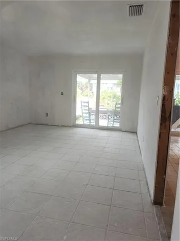 Owner Bedroom with Hurricane sliders and windows.