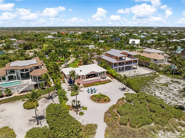 Steps from the sand and the sparkling waters of the Gulf.