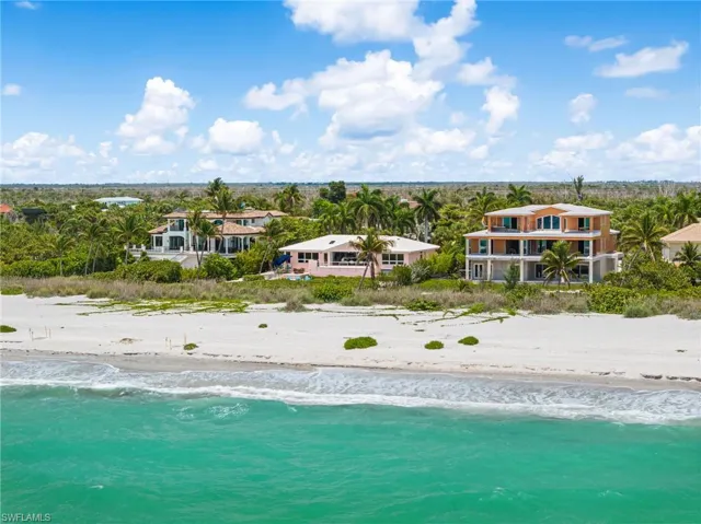 Steps from the sand and the sparkling waters of the Gulf.
