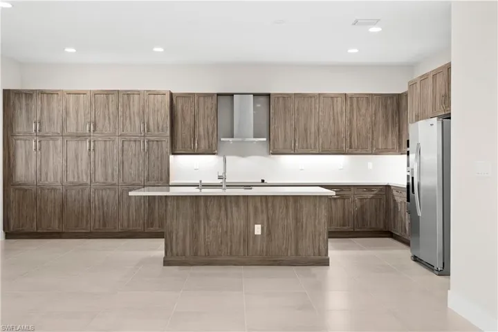 Main living area with recessed lighting and open layout