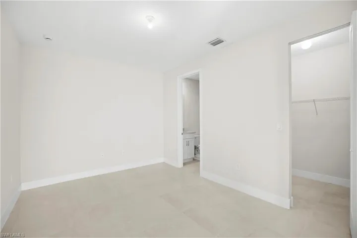 Walk-in closet with built-in shelving