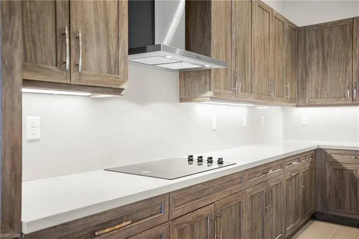 Expanded kitchen cabinetry with premium finishes