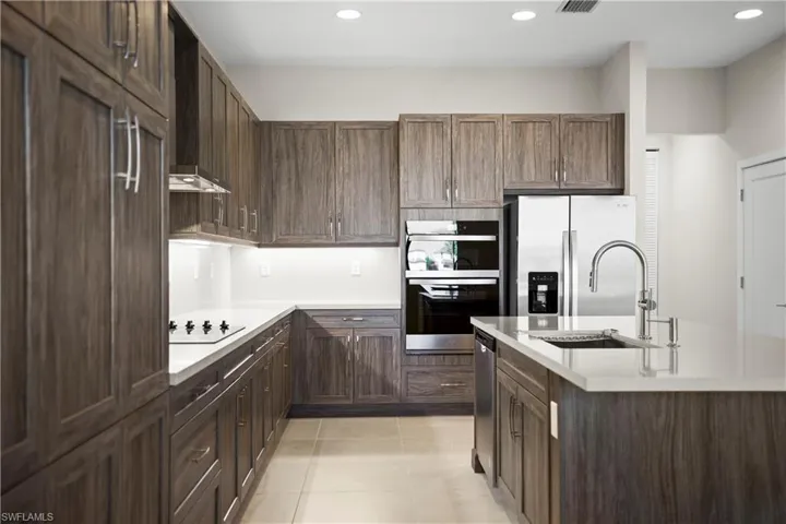 Kitchen island with quartz countertops and seating