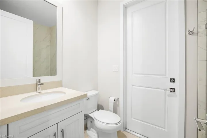Laundry room with cabinetry and utility space