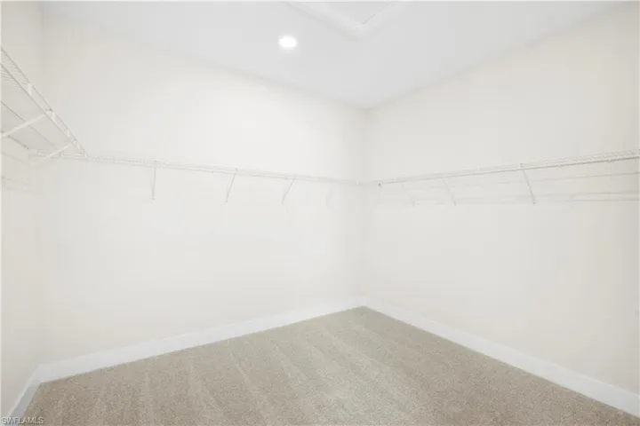 Alternate view of oversized primary walk-in closet