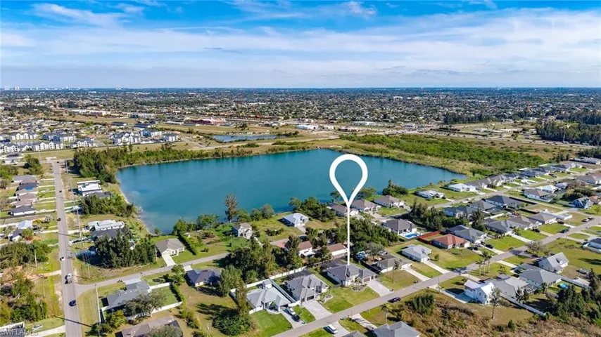 Bird's eye view with a residential view and a water view