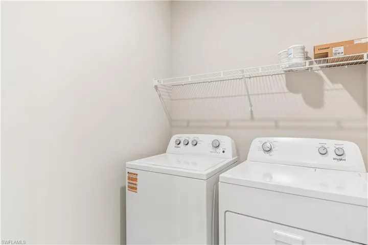 Washroom with separate washer and dryer