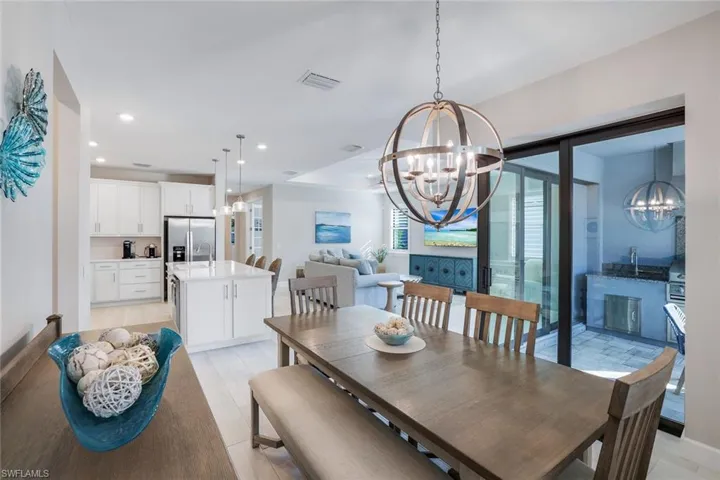 Dining area featuring hanging lights