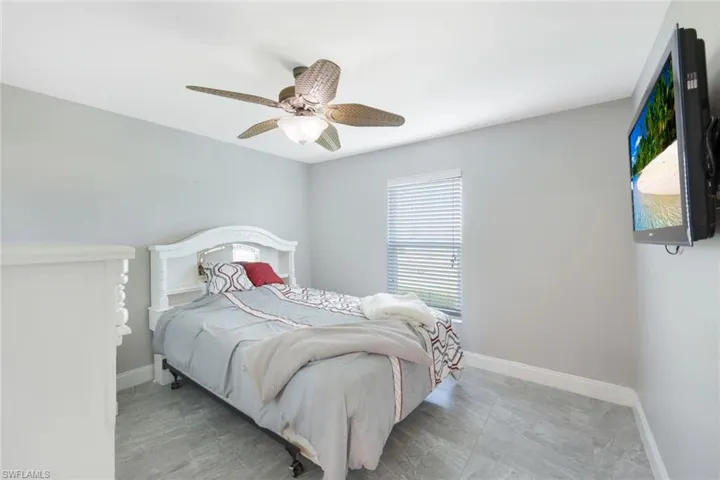 Bedroom featuring ceiling fan