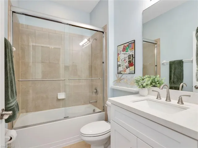 Guest Bathroom with Quartz Countertop and Tub/Shower Combo