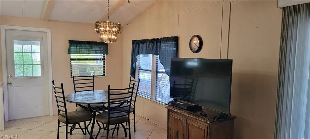 Tiled dining space, vaulted ceiling