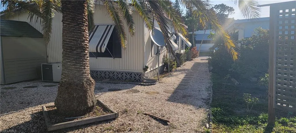 View of yard with cooling unit