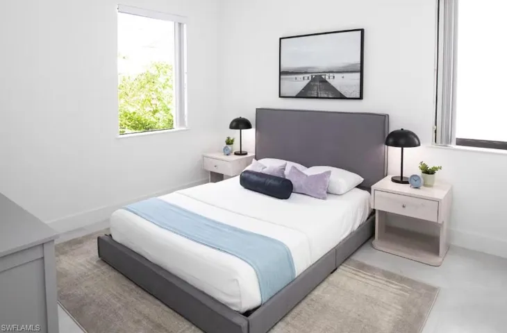 Bedroom with a swimming pool view