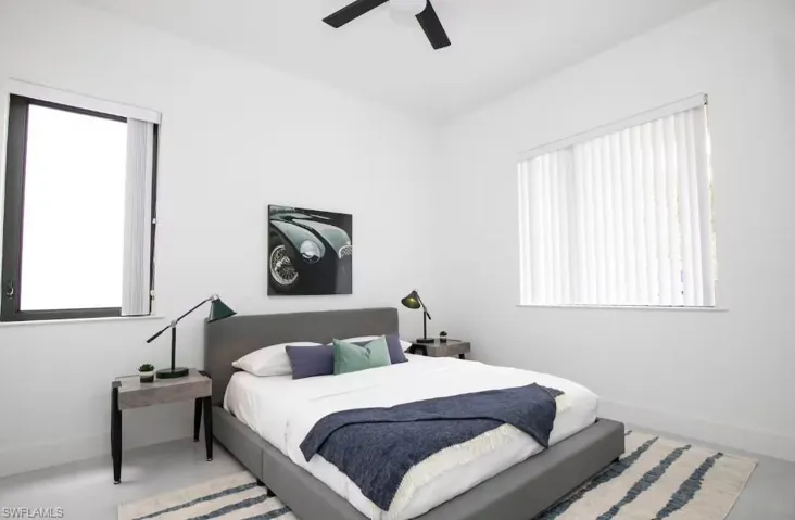 Bedroom with a front yard view