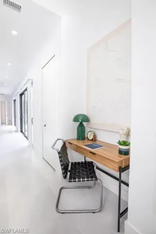 Office desk in a hallway