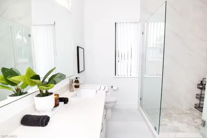 Master bathroom with a shower