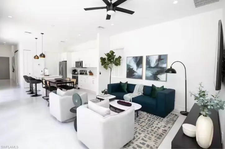 Open-concept living space, kitchen and dining area