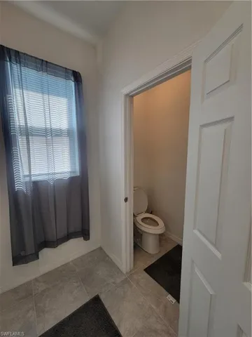 Bathroom with a tile shower