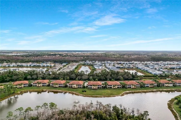 Aerial view of residential area with a large body of water