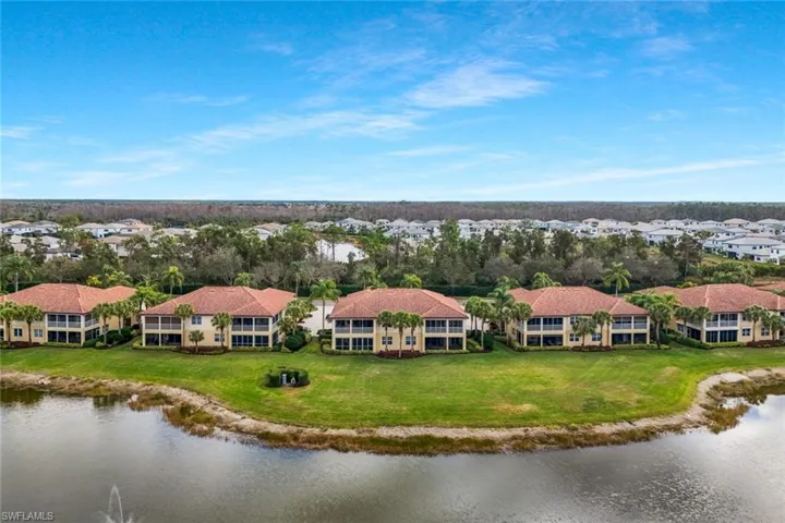 Aerial view of residential area with a large body of water