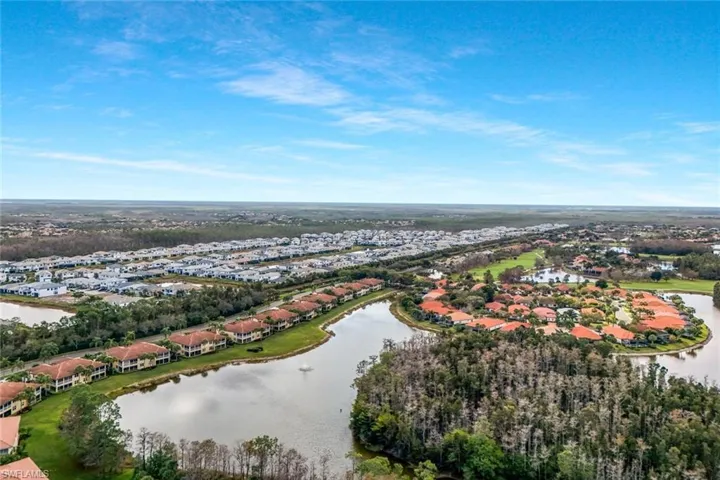 Aerial view of residential area with a large body of water