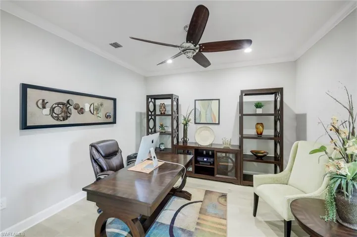 Office featuring ornamental molding, a ceiling fan, recessed lighting, and wood finished floors