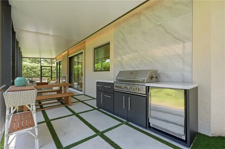 1123 Augusta Falls Way, Naples, Florida 34119