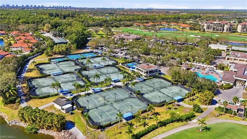 Multiple tennis courts, resort-style swimming pool, and golf course frontage