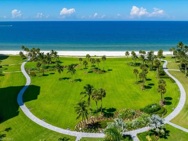 Aerial view with a beach view and a water view