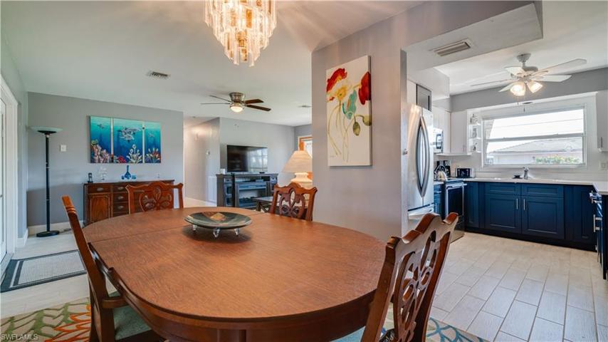 Dining area showing proximity to kitchen and living area.