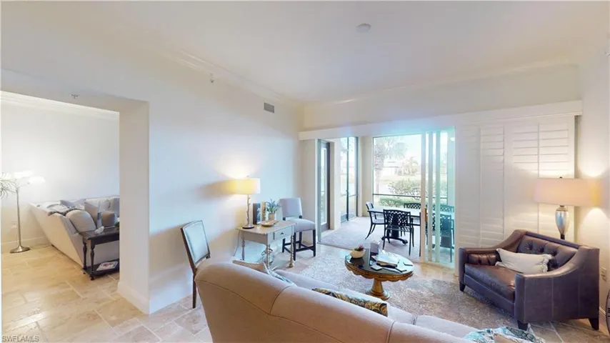 Living room featuring ornamental molding