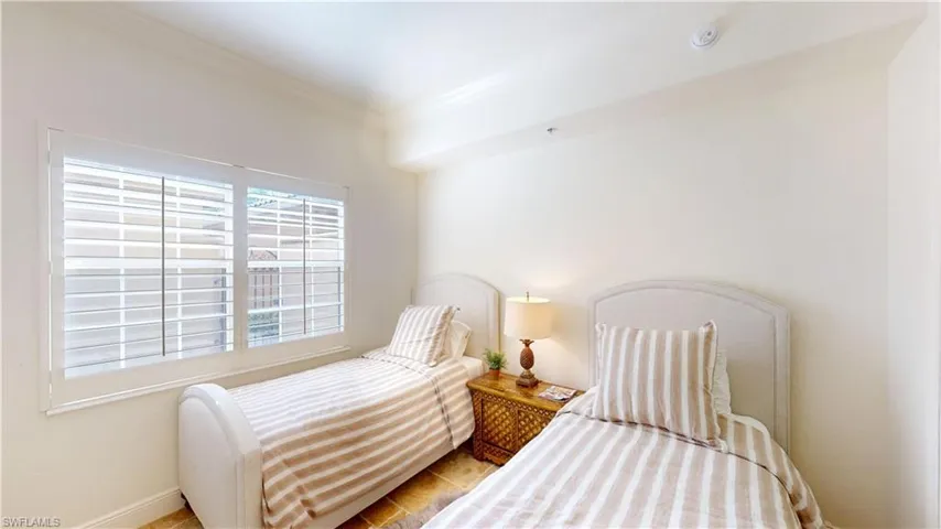 Bedroom featuring ornamental molding