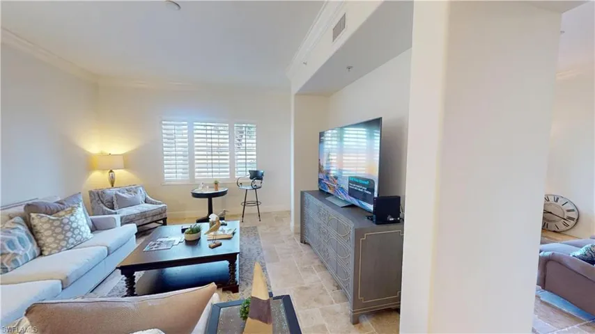 Living room with ornamental molding