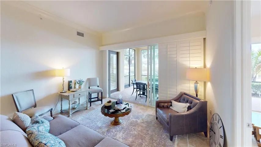 Living room with ornamental molding
