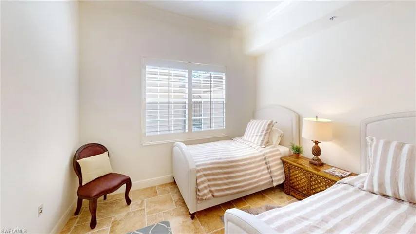 Bedroom featuring crown molding