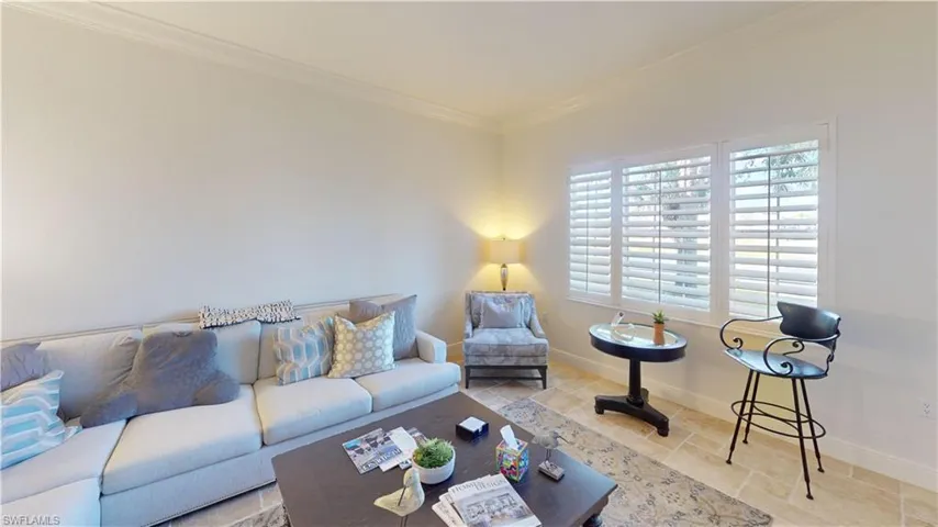 Living room with ornamental molding