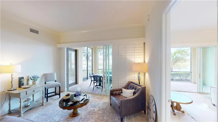 Sitting room featuring crown molding