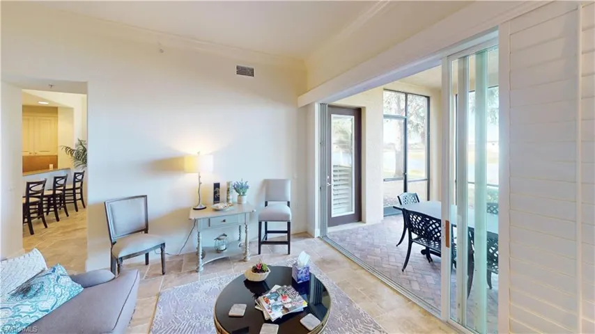 Living room featuring ornamental molding