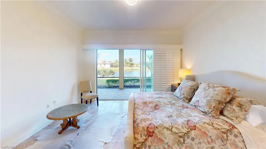 Bedroom featuring ornamental molding