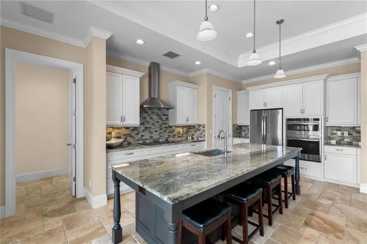 Chef's Kitchen with large granite island.