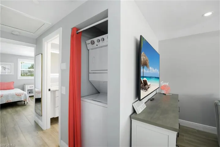 Functional laundry space with ample storage (Beach home 1) - Virtually Edited Image
